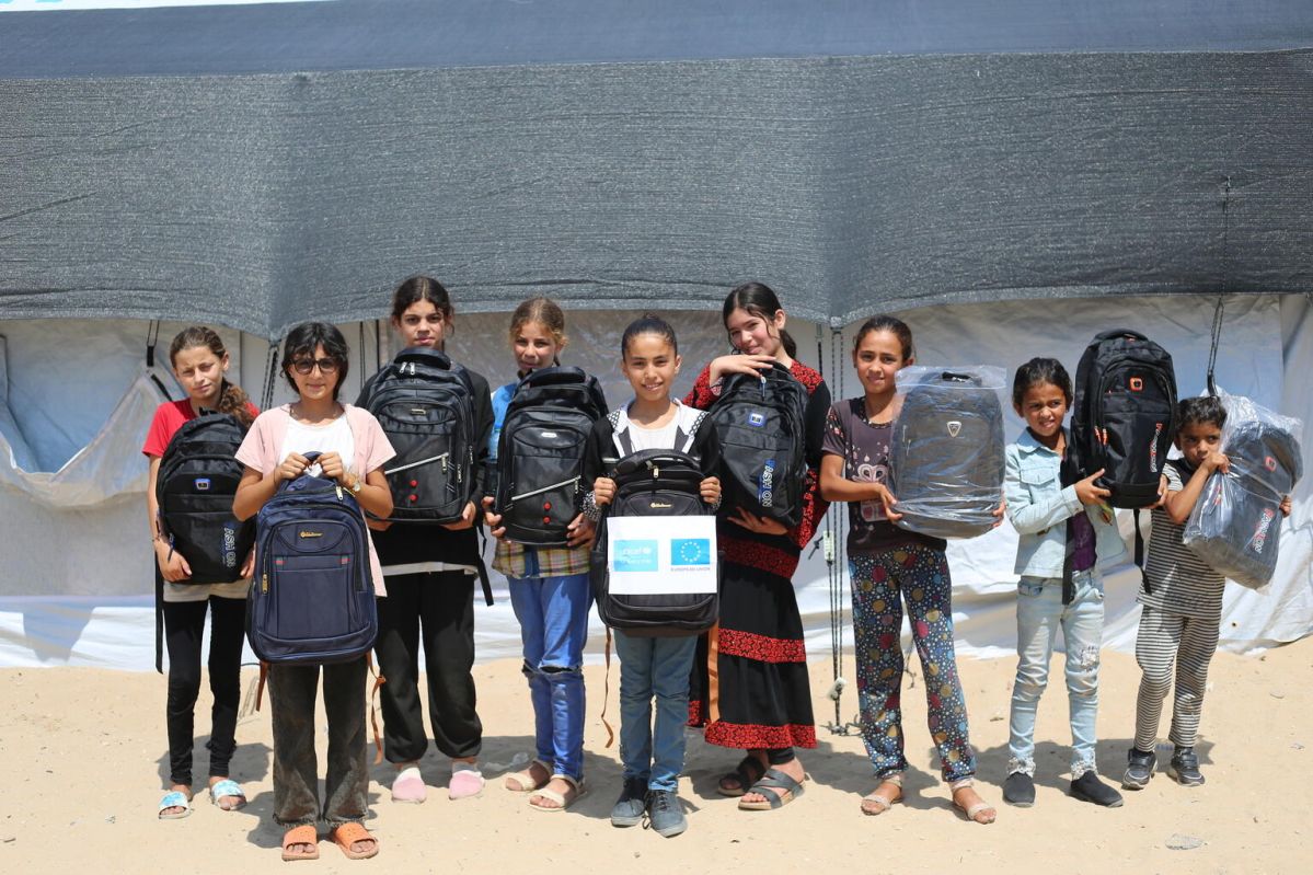 Children with school supplies