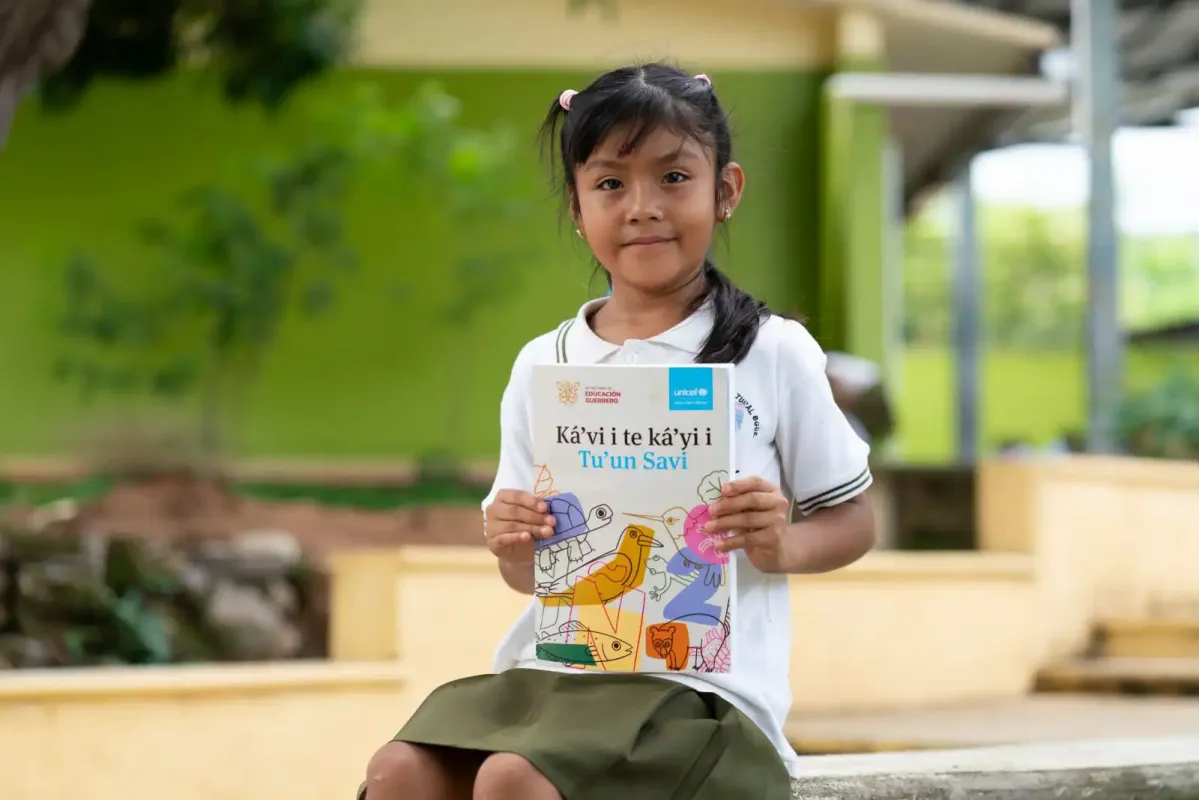 Indigenous girl with book