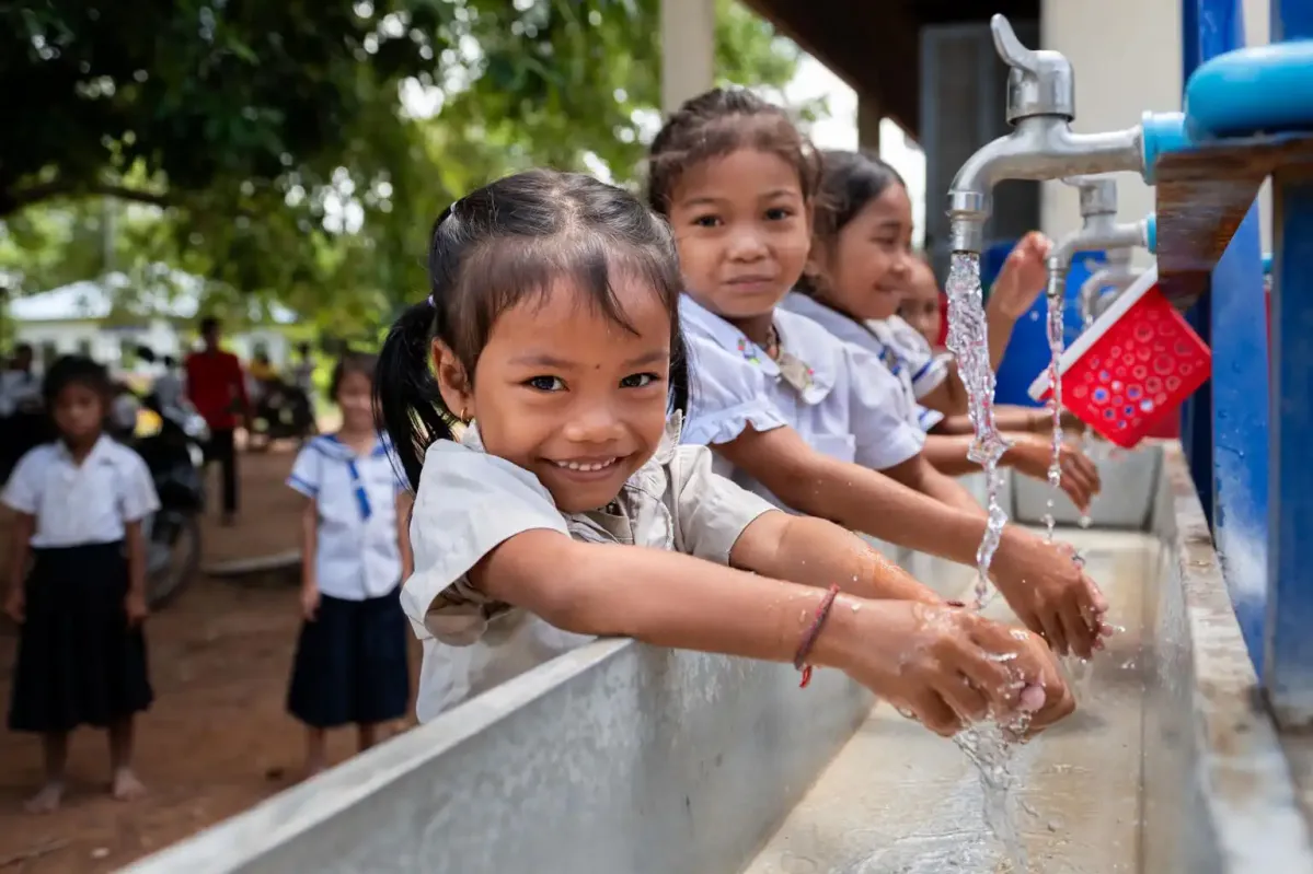 Girls washing their hands