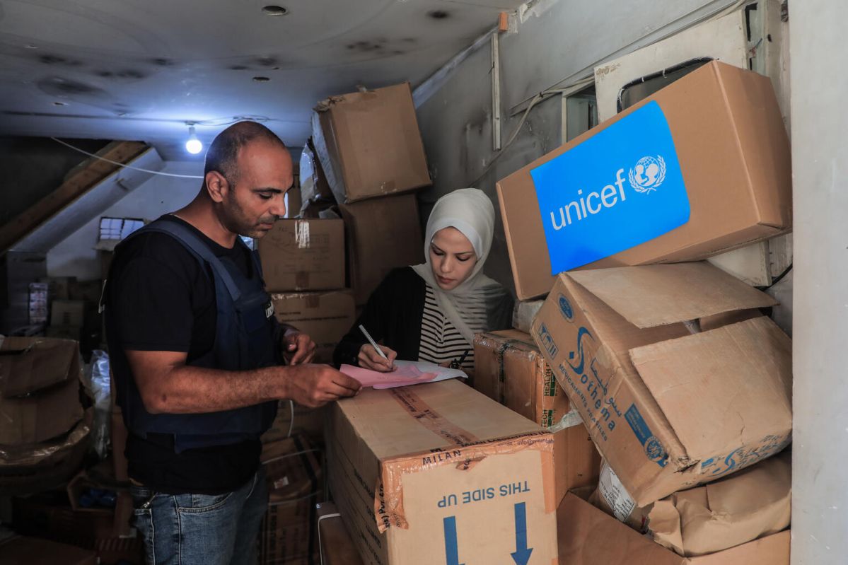 UNICEF staff with supplies