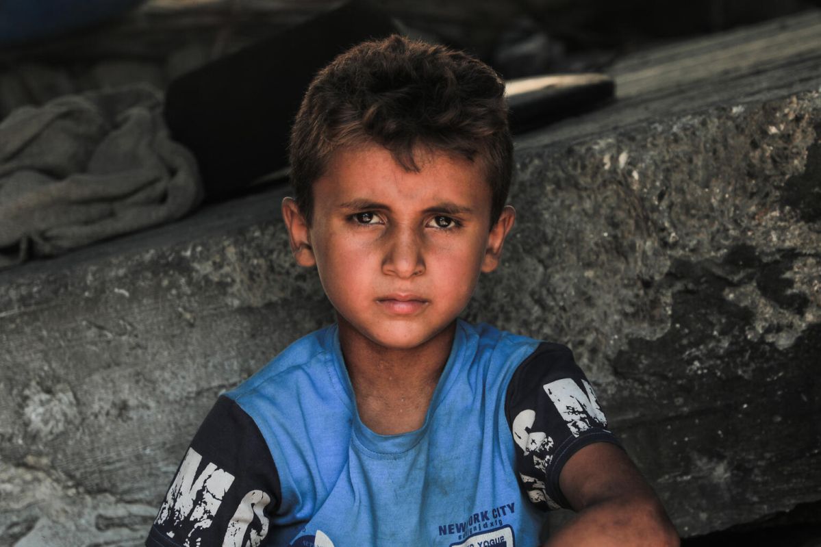Child amongts rubble, Palestine