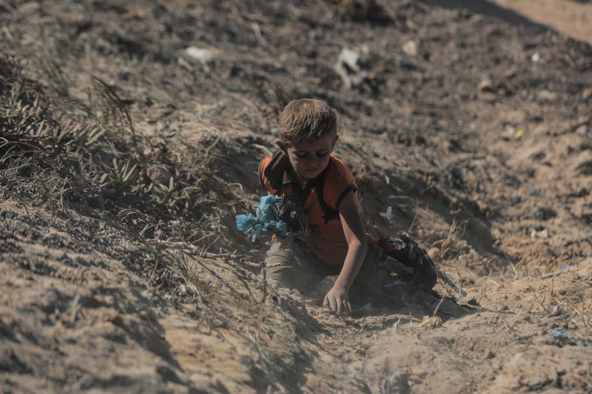 Child among the rubble on the Gaza coast