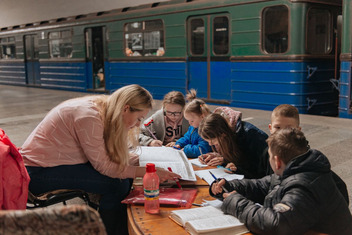 Children using notebooks