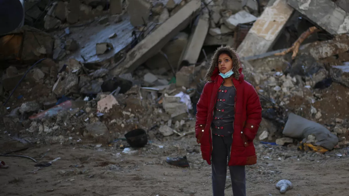 A girl from Gaza in her red coat