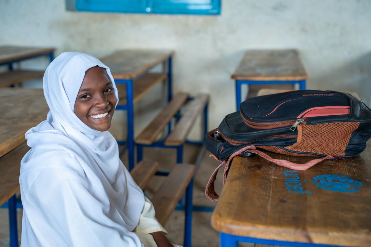 Sudanese student on classroom desk