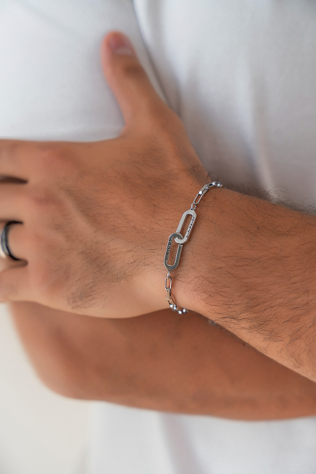 Nora and Khalid | Khalid wearing UNICEF Promise Bracelet