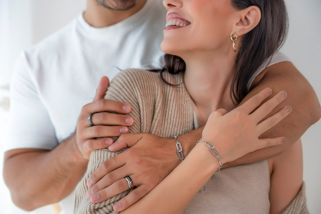 Nora and Khalid wearing UNICEF Promise Bracelet